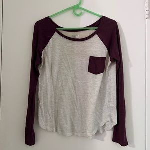 Baseball-tee styled, purple and white shirt